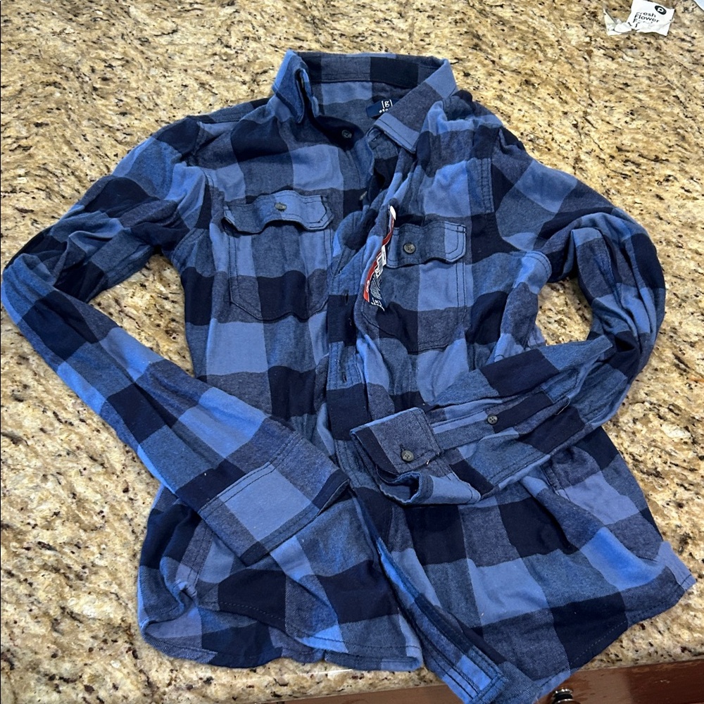 2 men’s flannel shirts
